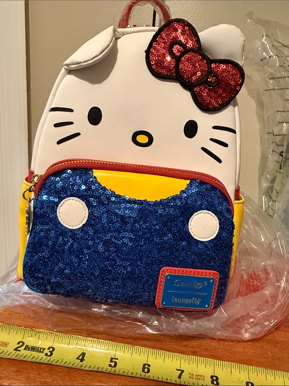 Hello Kitty Sequin Mini Backpack in White, Blue, Red, Yellow